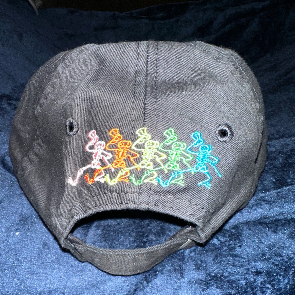 Grateful Dead. “GD” logo front. “Dancing Skeletons” back. Adjustable